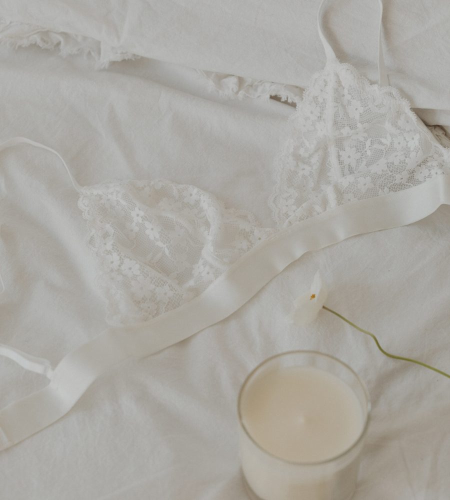 kaboompics_white-lace-triangle-bra-white-candle-31751